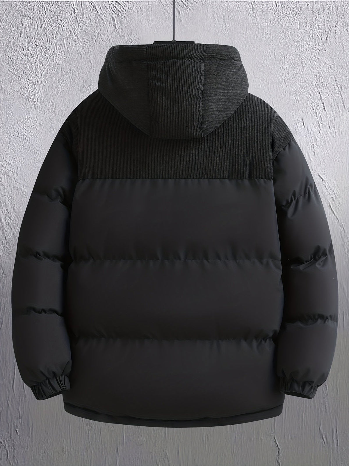 Close-up of the men's detachable hood jacket fabric and stitching