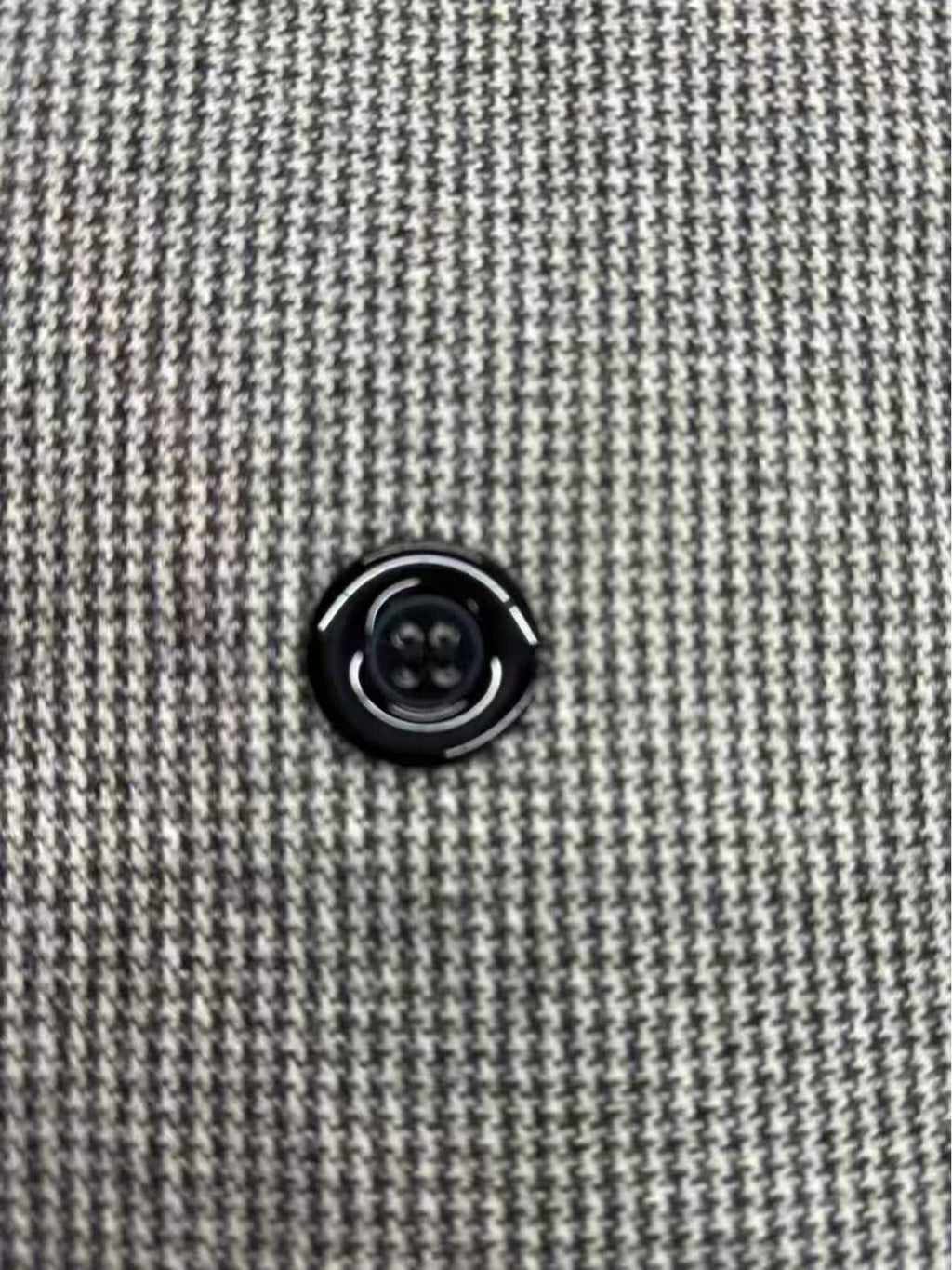 Men's houndstooth overcoat styled with jeans for cold weather