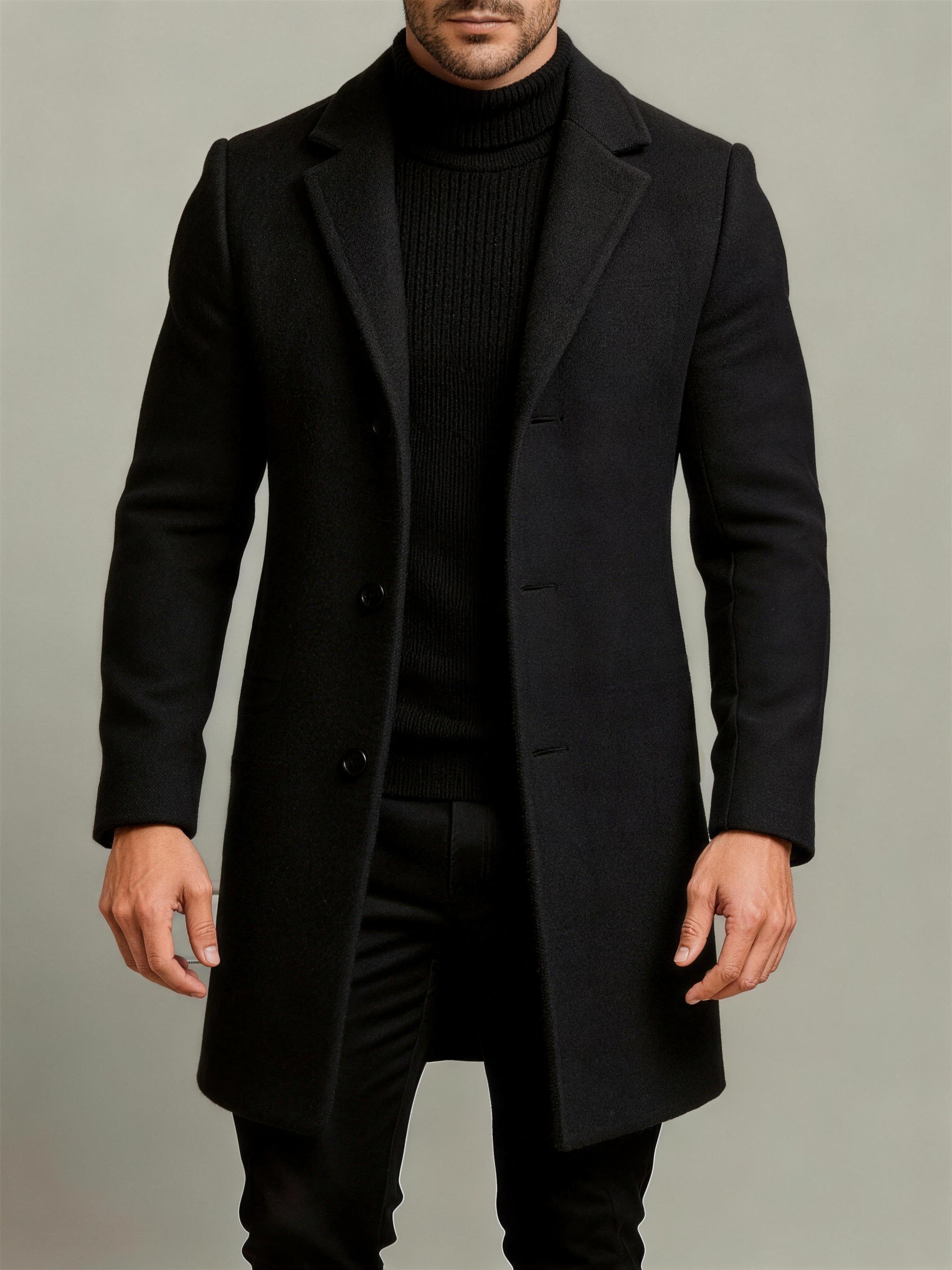 Men's lightweight trench coat styled with jeans for cold weather