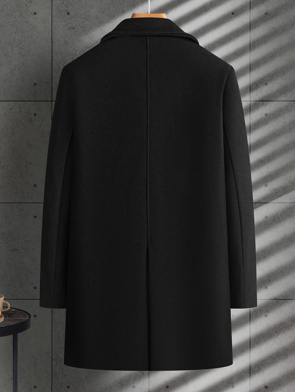 Men's double-breasted trench coat styled with jeans for cold weather