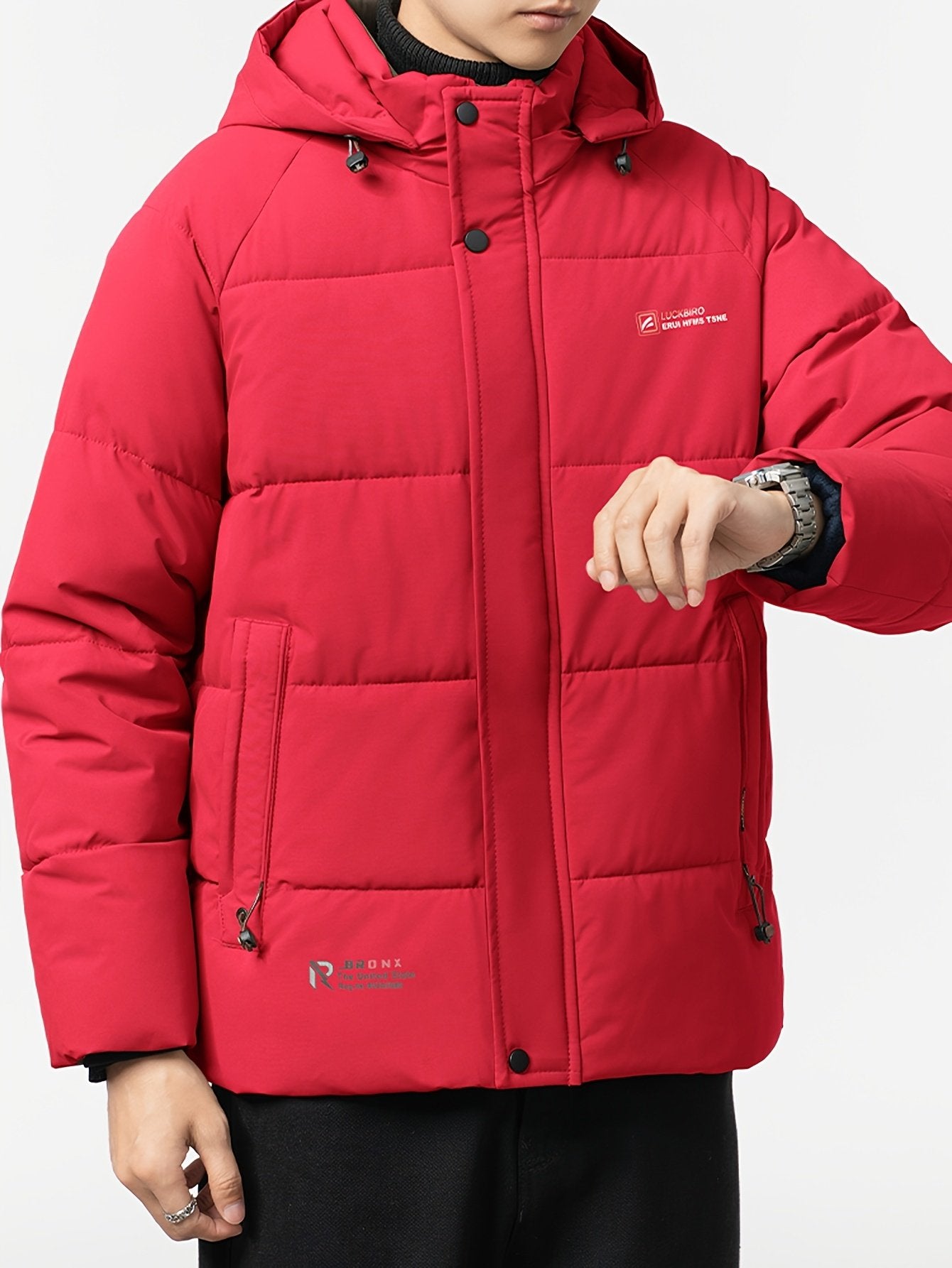 Men's short hooded winter jacket styled with jeans for cold weather