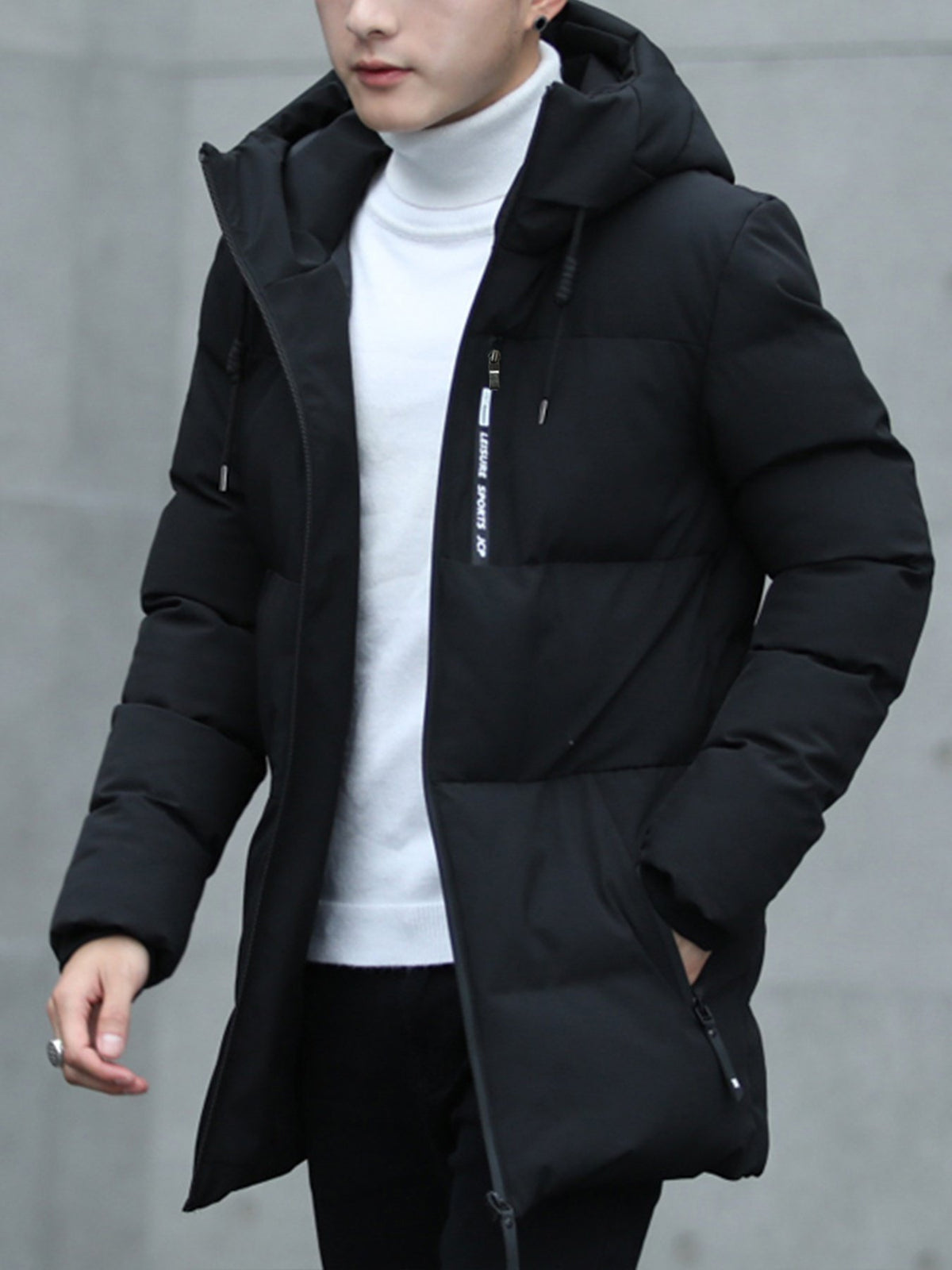 Side view of the men's mid-length padded parka showing the fit