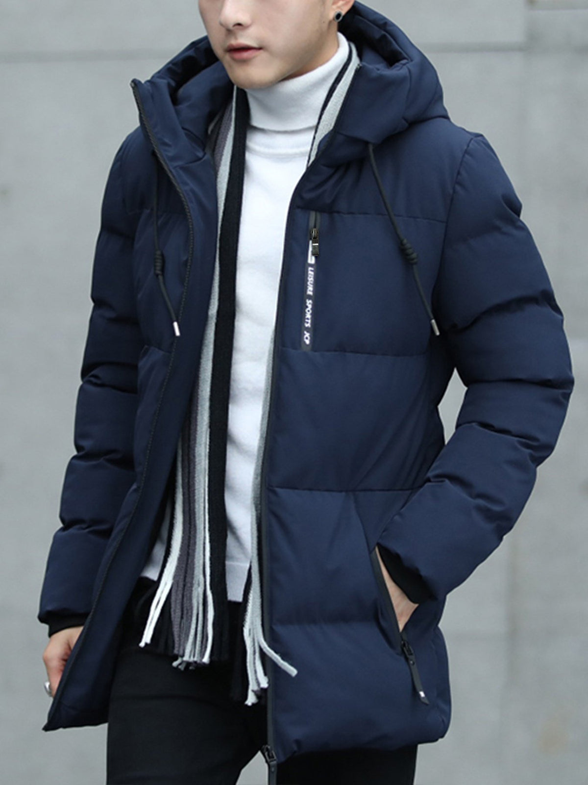 Back view of the men's mid-length padded parka