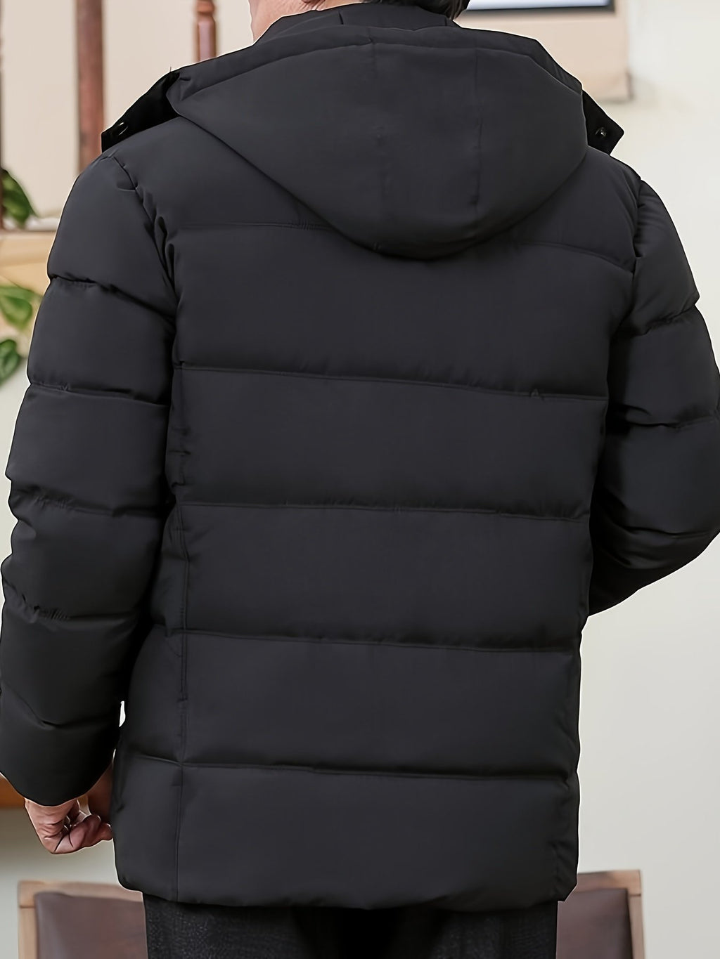 Side view of the men's fleece-lined hooded coat showing the fit