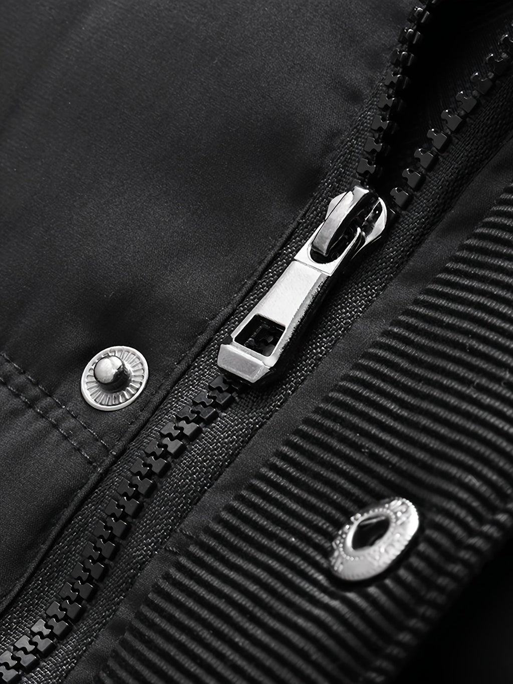 Close-up of the men's fleece-lined hooded coat fabric and stitching