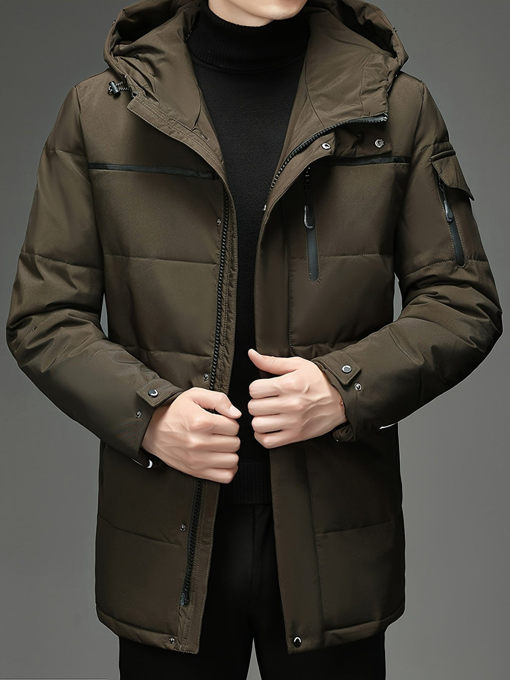 Close-up of the men's padded hooded parka fabric and stitching