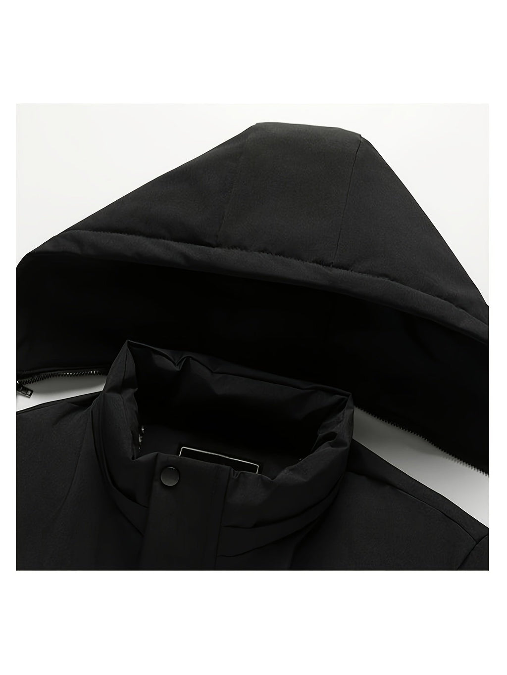 Men's fleece-lined padded jacket styled with jeans for cold weather