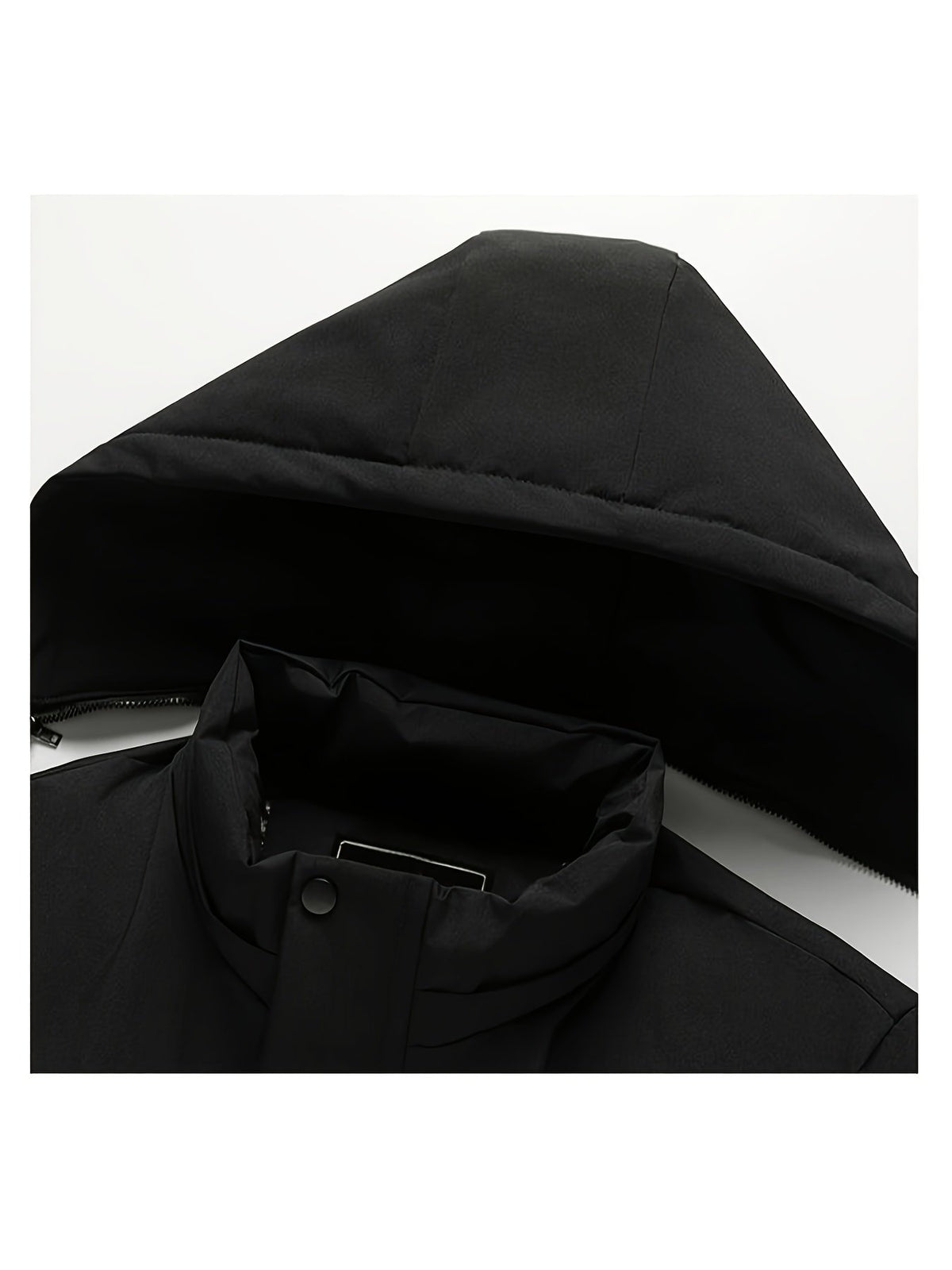 Men's fleece-lined padded jacket styled with jeans for cold weather