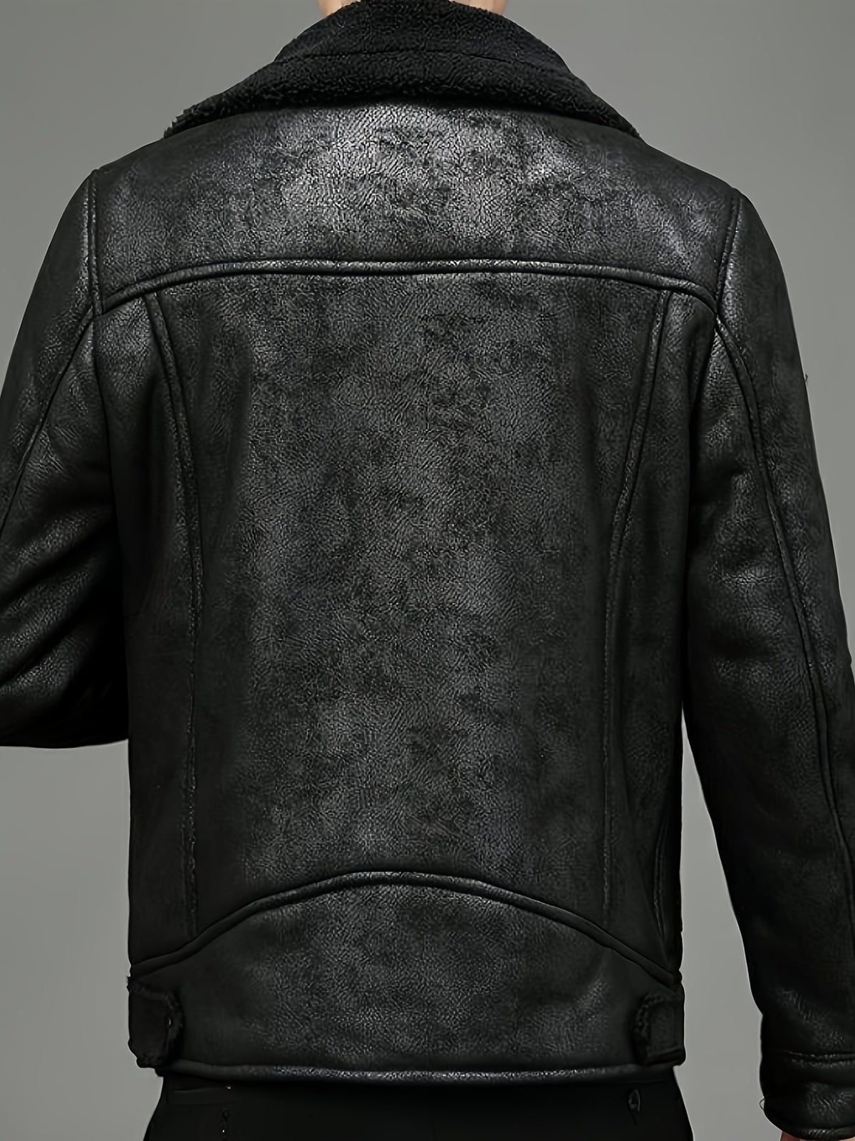 Collar and fastening detail of the men's faux leather jacket