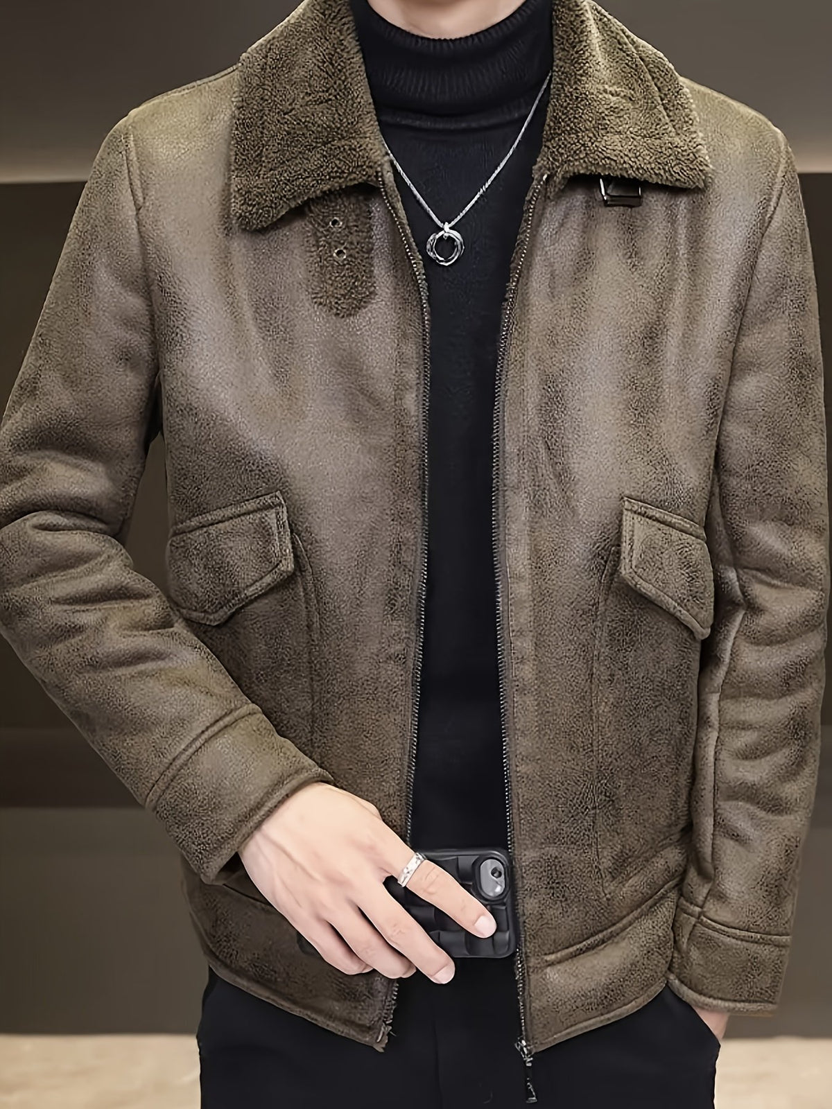 Men's faux leather jacket styled with jeans for cold weather