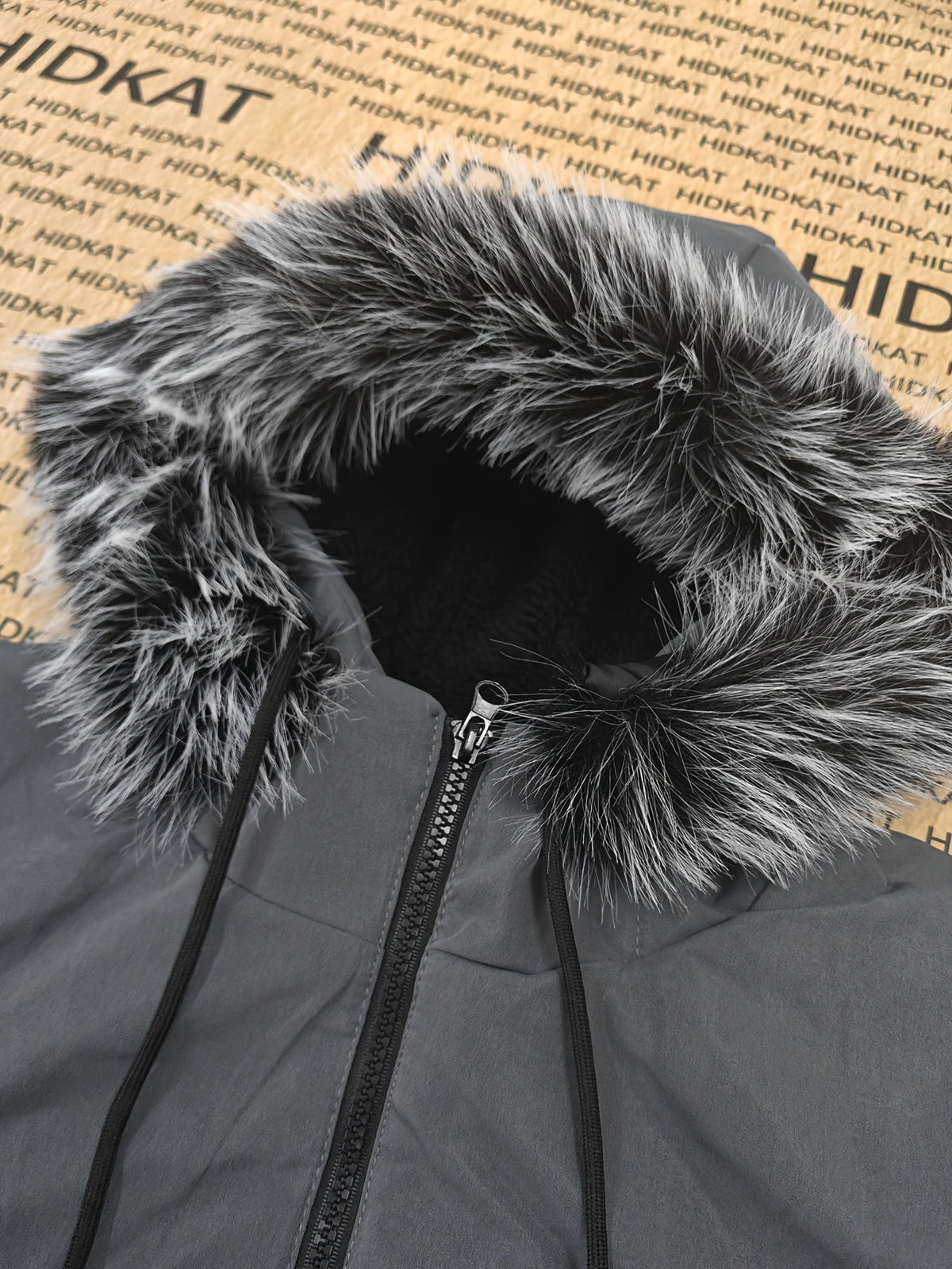 Back view of the men's knee-length padded coat