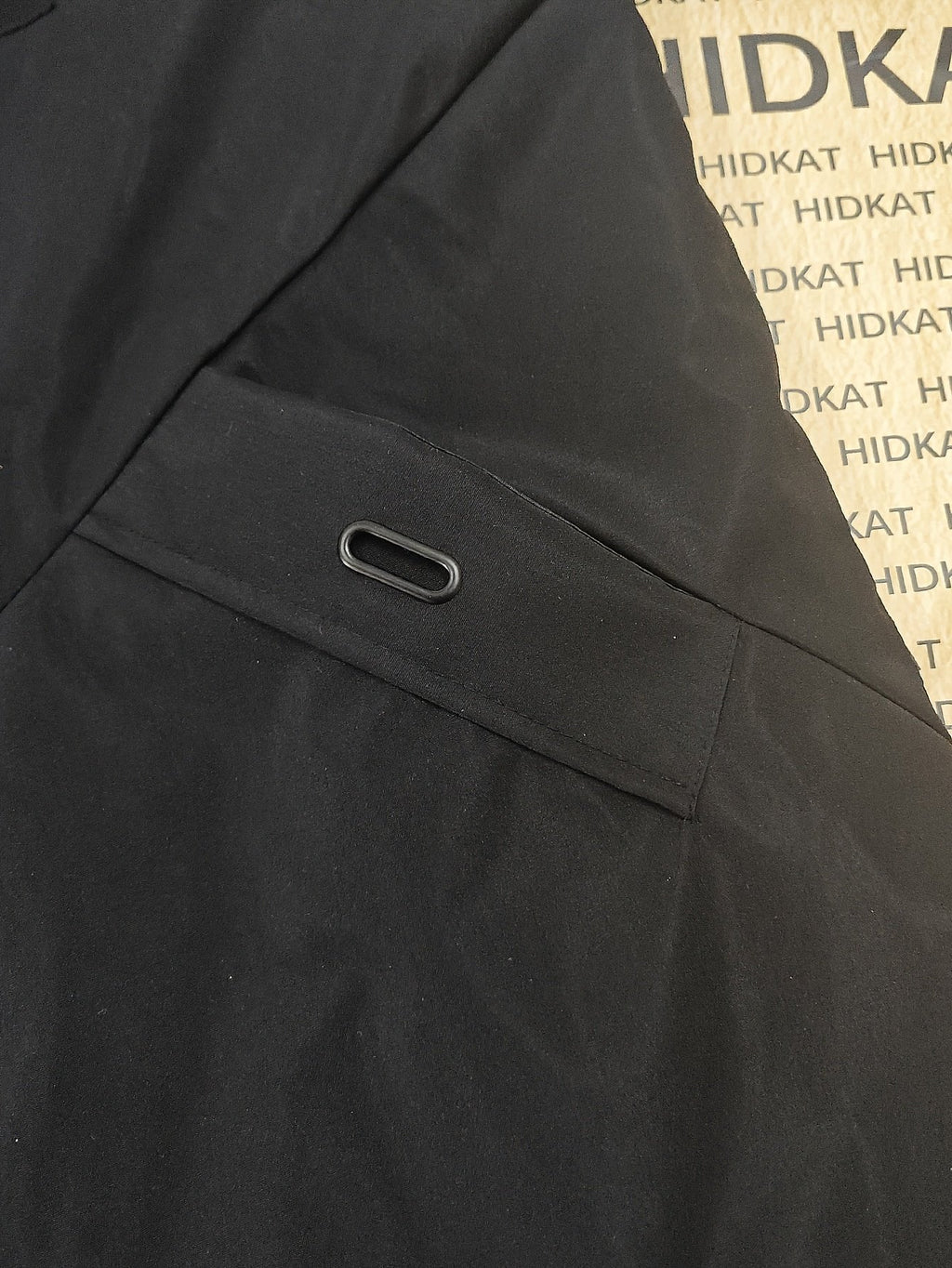 Men's knee-length padded coat styled with jeans for cold weather
