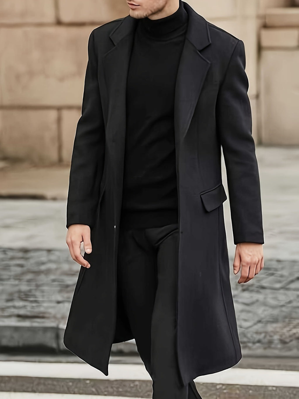 Men's long warm trench coat styled with jeans for cold weather