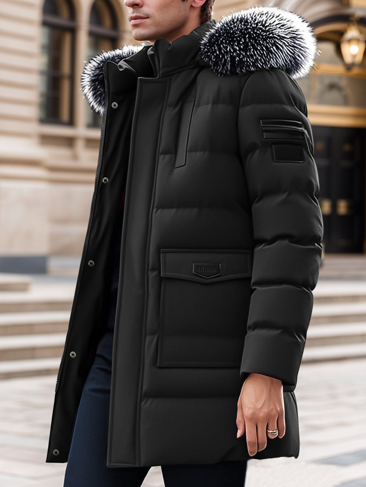 Men's mid-length hooded parka styled with jeans for cold weather