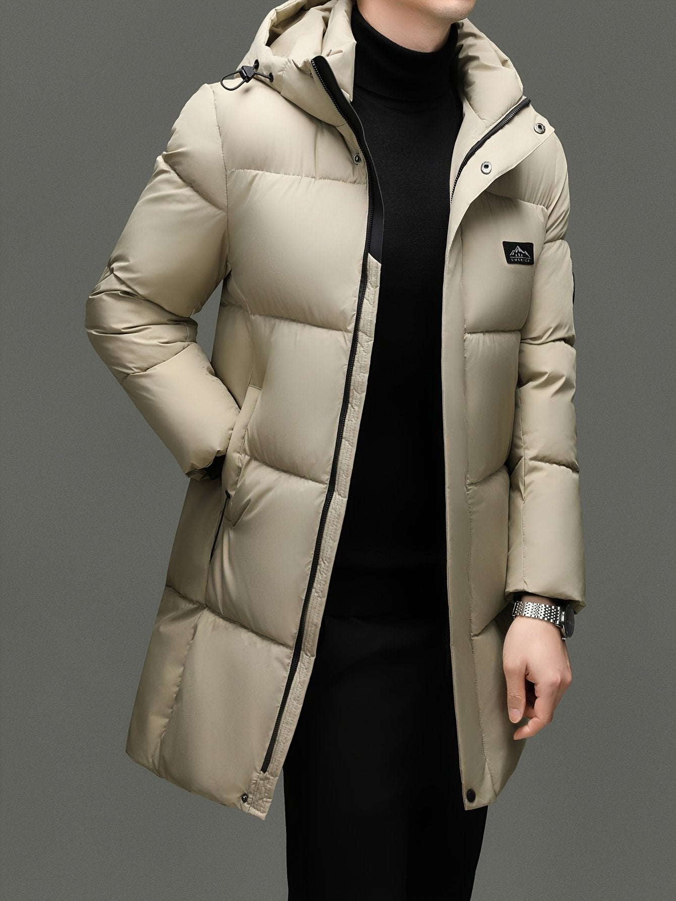 Men's long padded puffer jacket shown from the front for winter