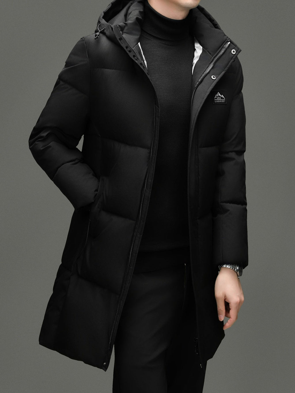 Pocket detail on the men's long padded puffer jacket
