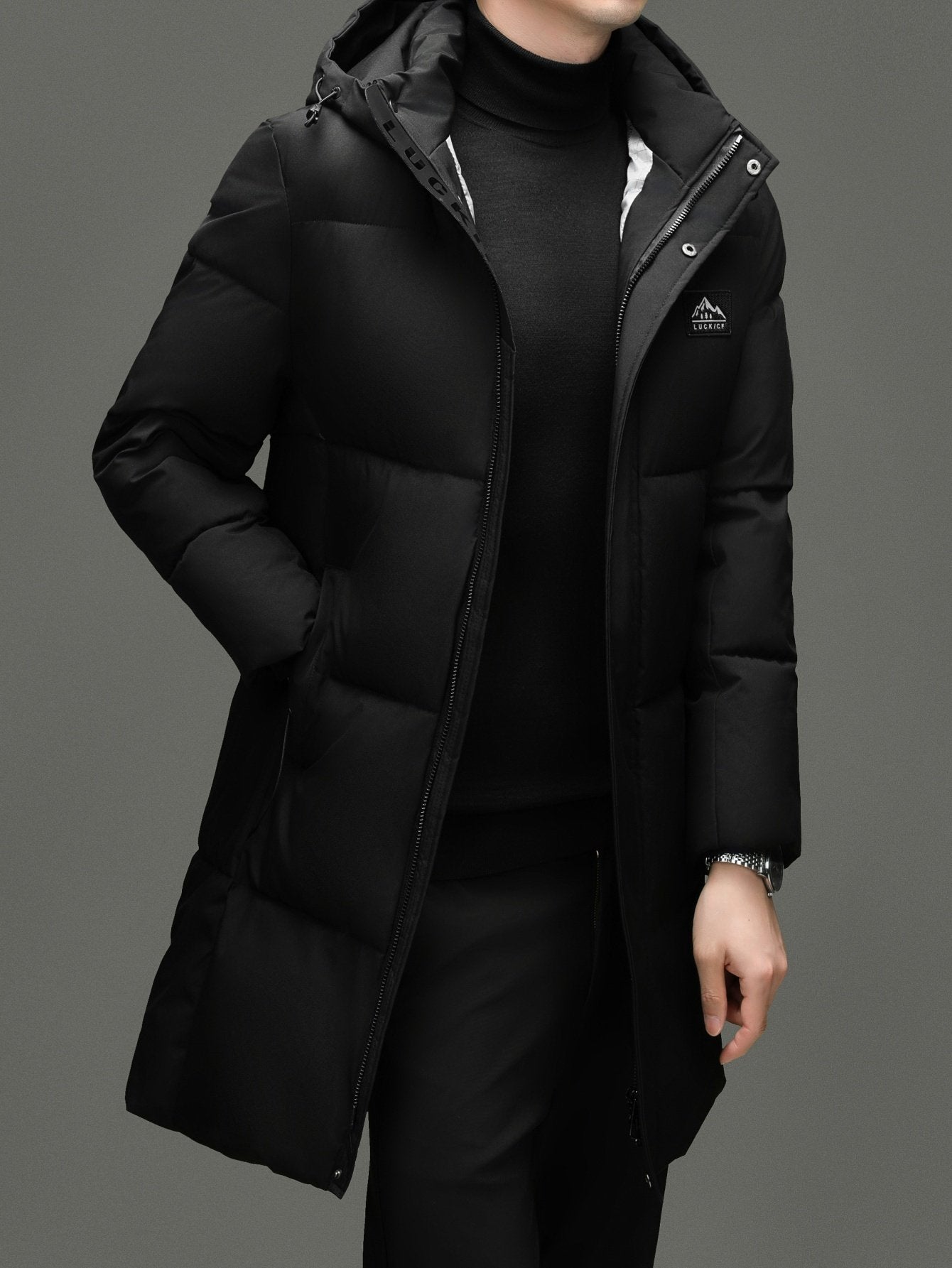 Pocket detail on the men's long padded puffer jacket