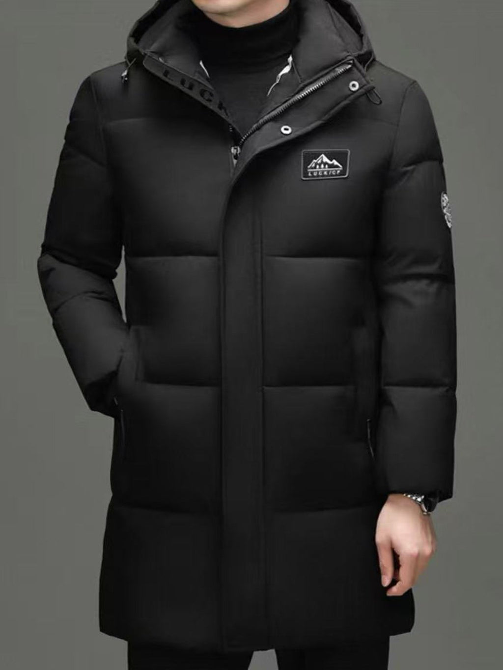Pocket detail on the men's mid-length hooded padded coat