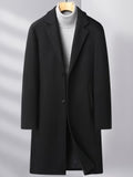 Pocket detail on the men's knee-length wool overcoat