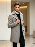 Pocket detail on the men's houndstooth overcoat