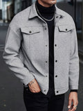 Pocket detail on the men's short lapel jacket