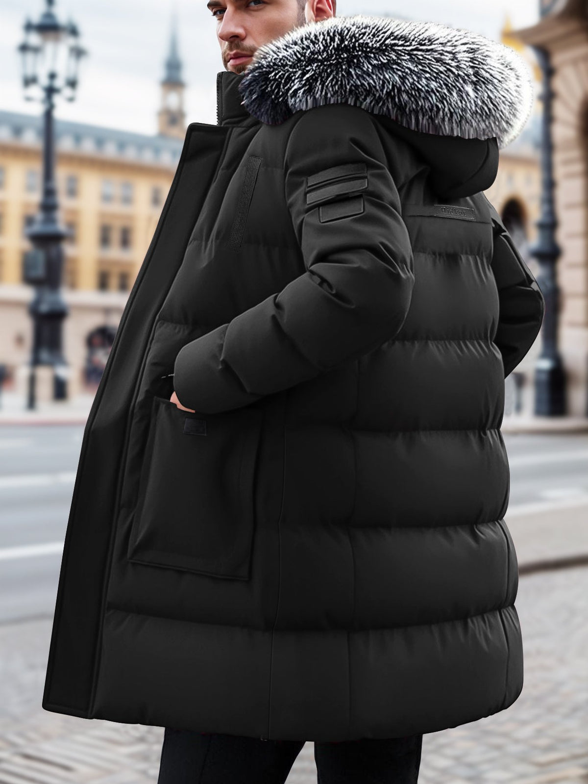 Cuff and sleeve detail of the men's mid-length hooded parka