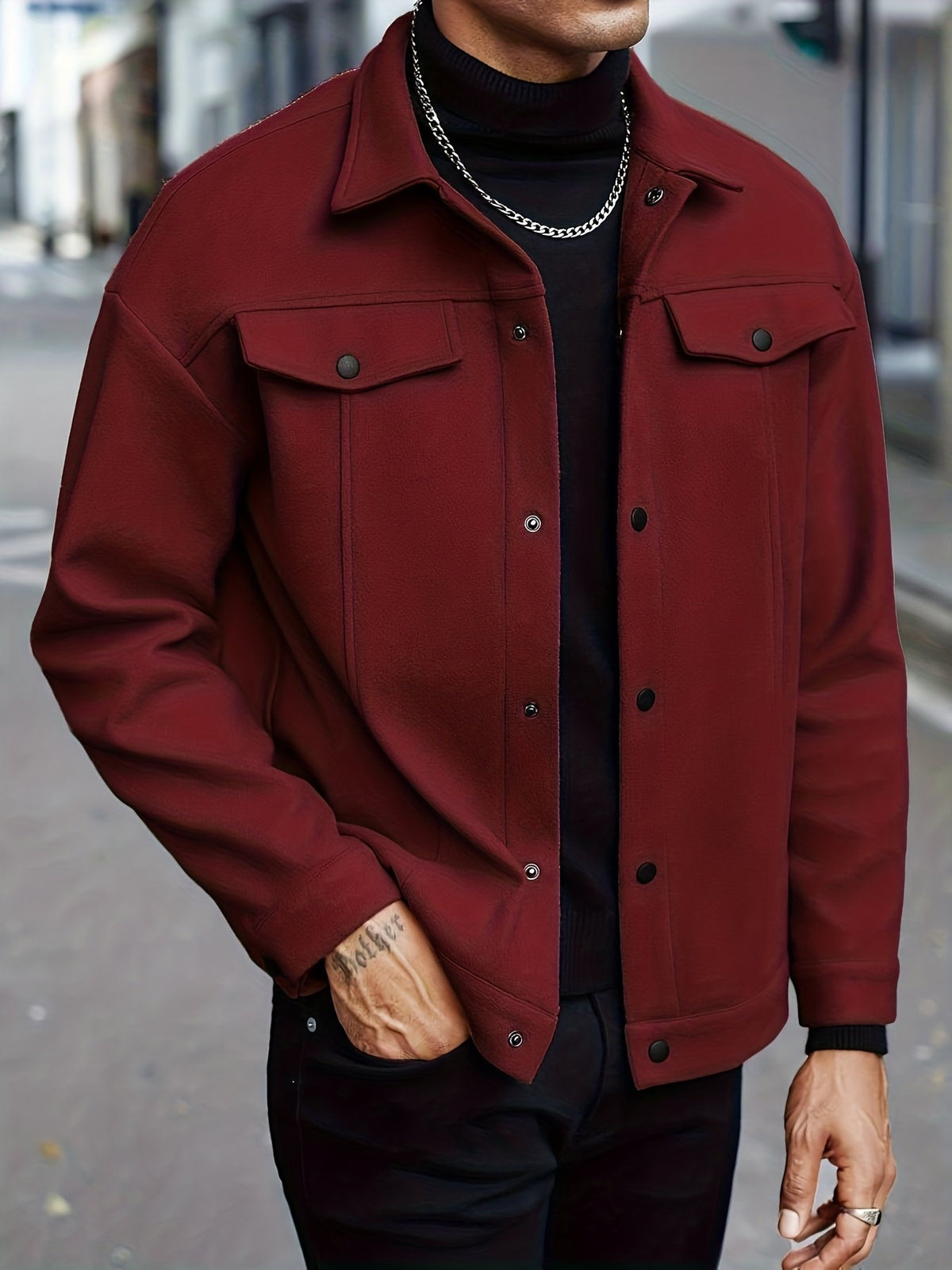 Men's short lapel jacket shown at an angle