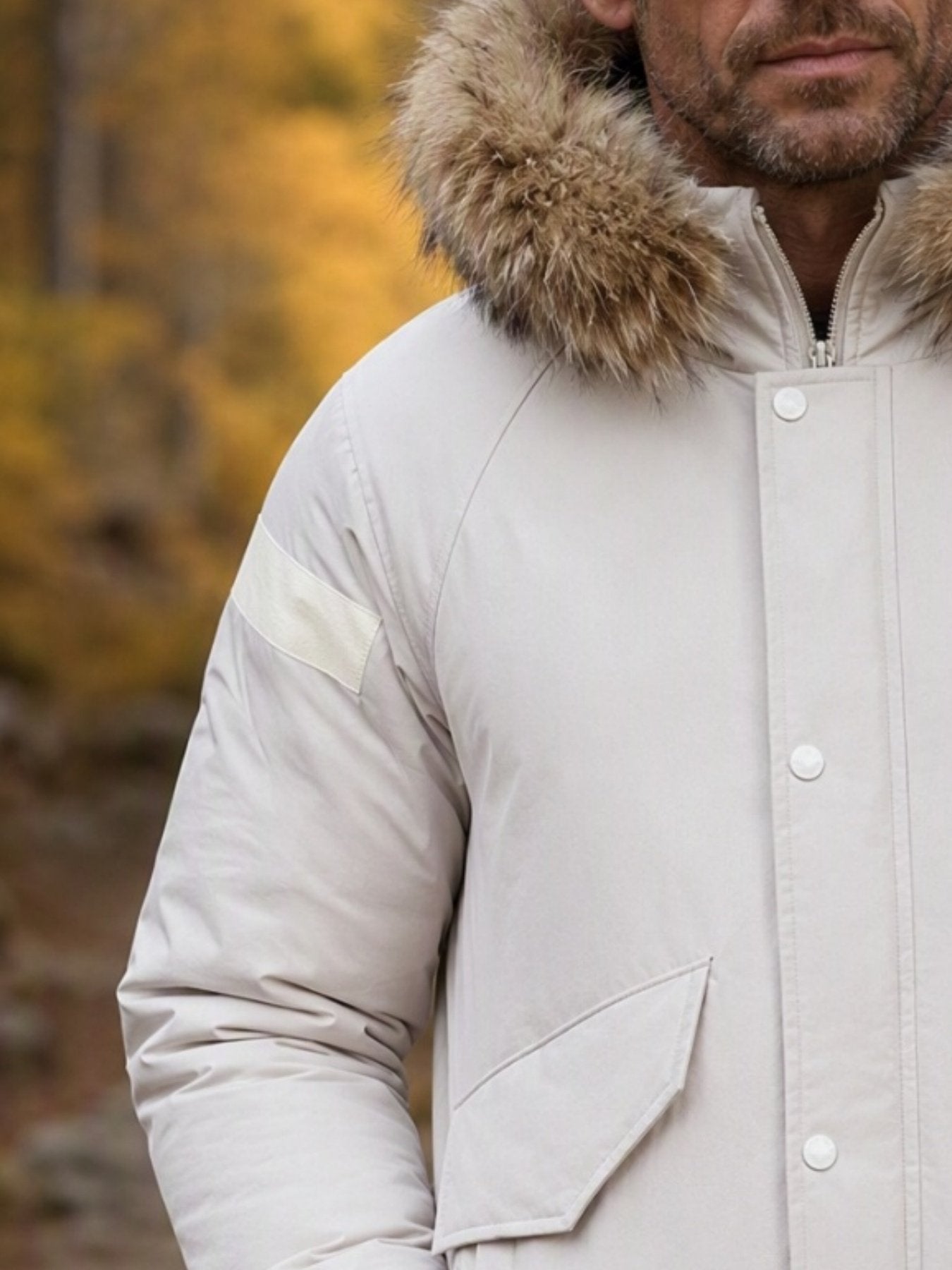 Close-up of the men's mid-length duck down coat fabric and stitching