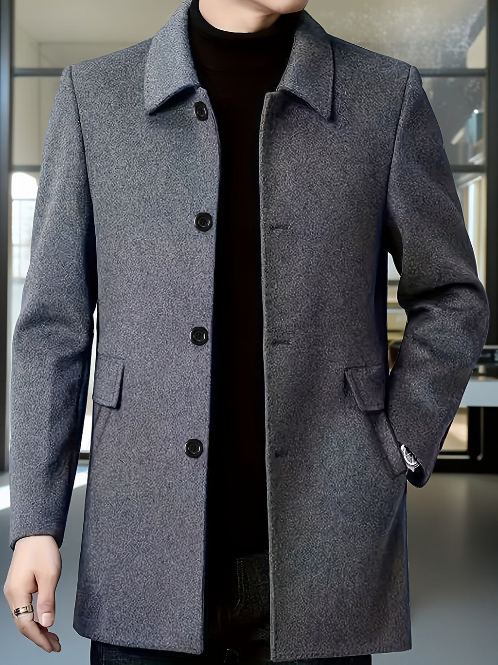 Collar and fastening detail of the men's single-breasted overcoat